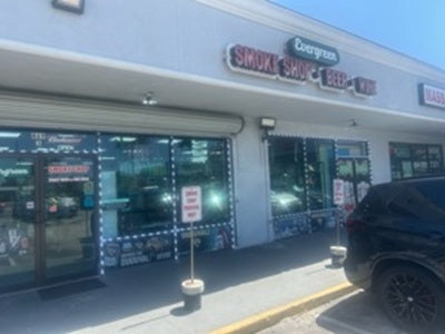 Evergreen Smoke and Mini Mart storefront in Atlantic Beach, FL