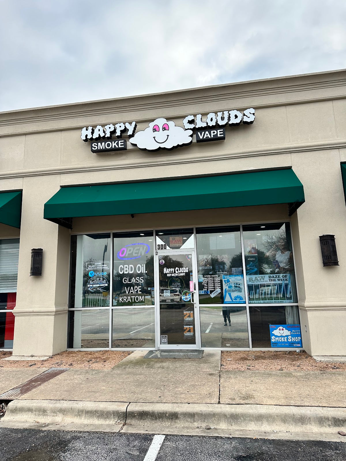Happy Clouds Smoke Shop storefront in Austin, TX