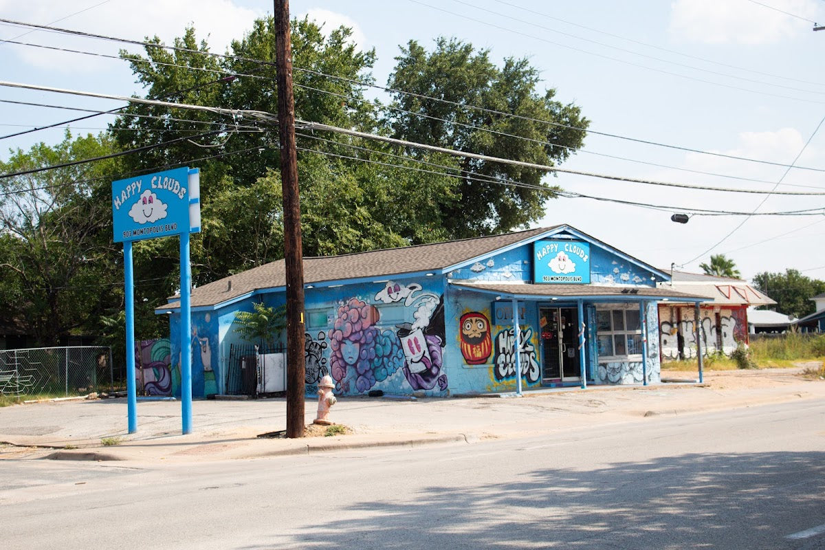 Happy Clouds Smoke Shop storefront in Austin, TX
