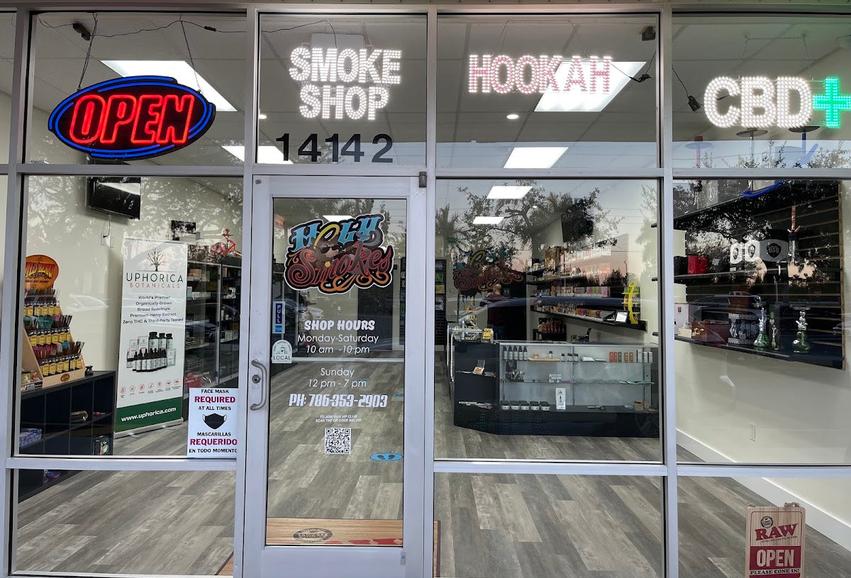 Holy Smokes 8th St. Smoke Shop storefront in Miami, FL