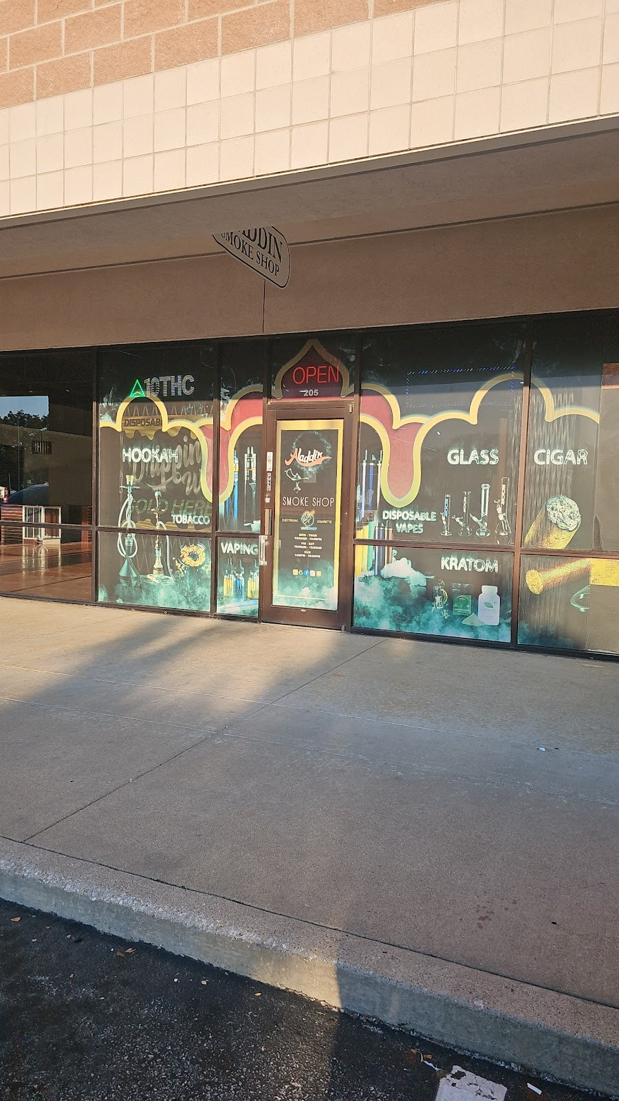 Aladdin Smoke Shop storefront in Watauga, TX